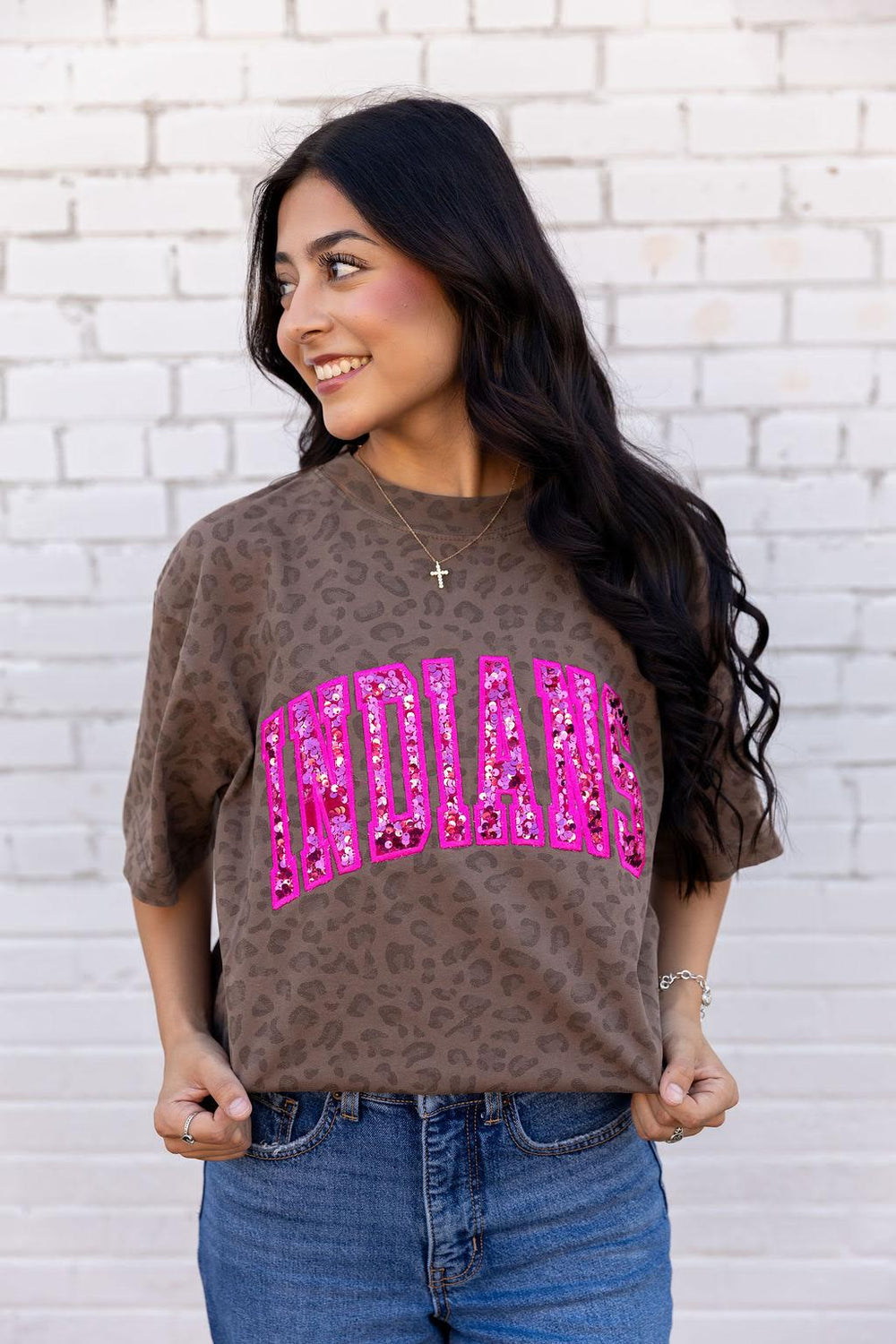 Model wearing a pink Indians leopard spirit shirt